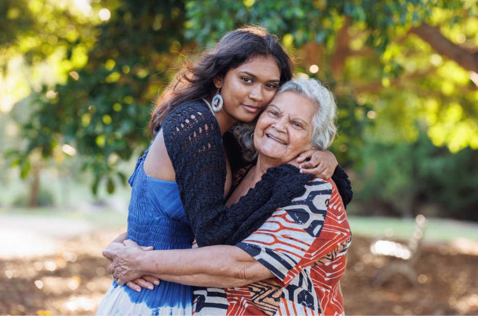 naidoc week aboriginal torres strait islander first nations communities grandmother granddaughter outdoor nature embrace