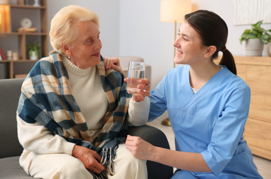 carer caregiver support worker elderly woman comfort reassurance australian government reform aged care skills